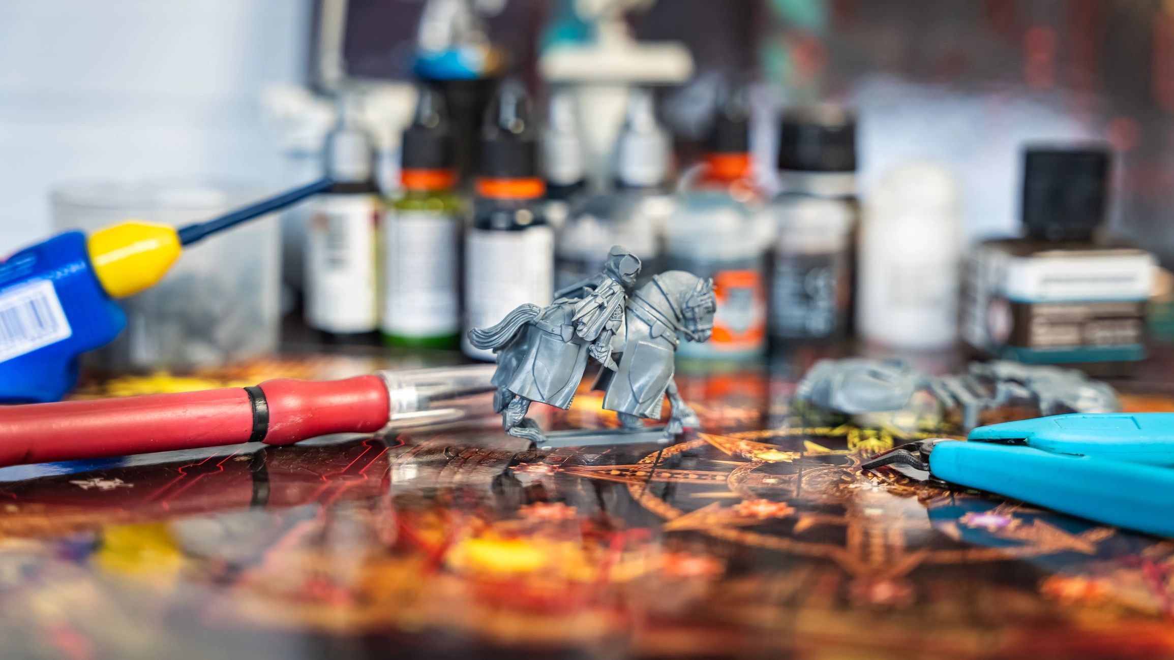 Tools and supplies for assembling and painting tabletop miniatures